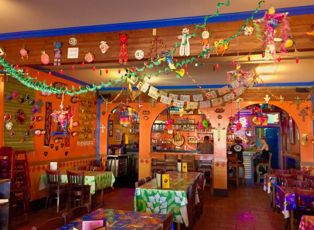 Colorful orange, yellow, blue and green mexican restaurant on the island of Oahu in Haleiwa